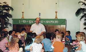 Pastor giving a childrens message